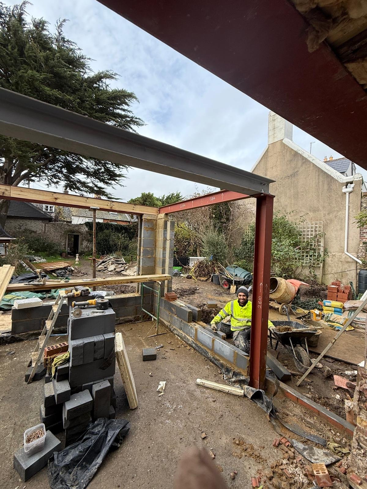 Steel beams craned in and pinned.
