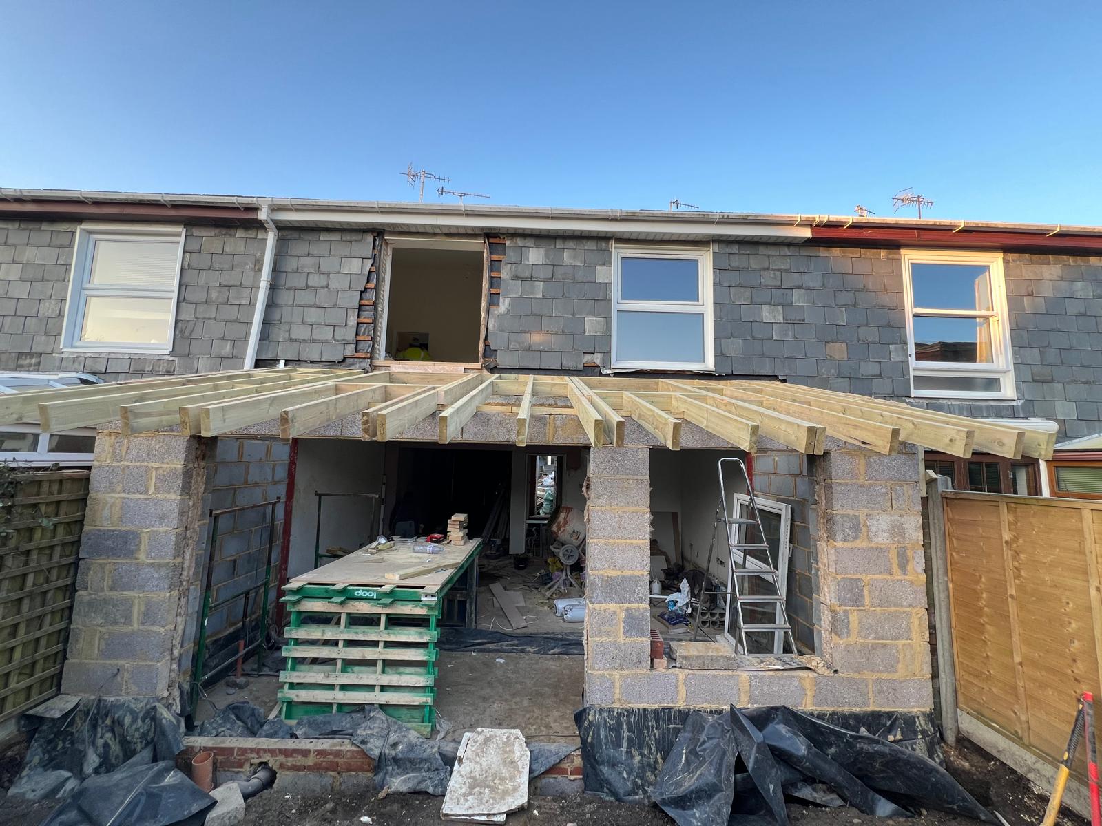Timber rafters lifted into place